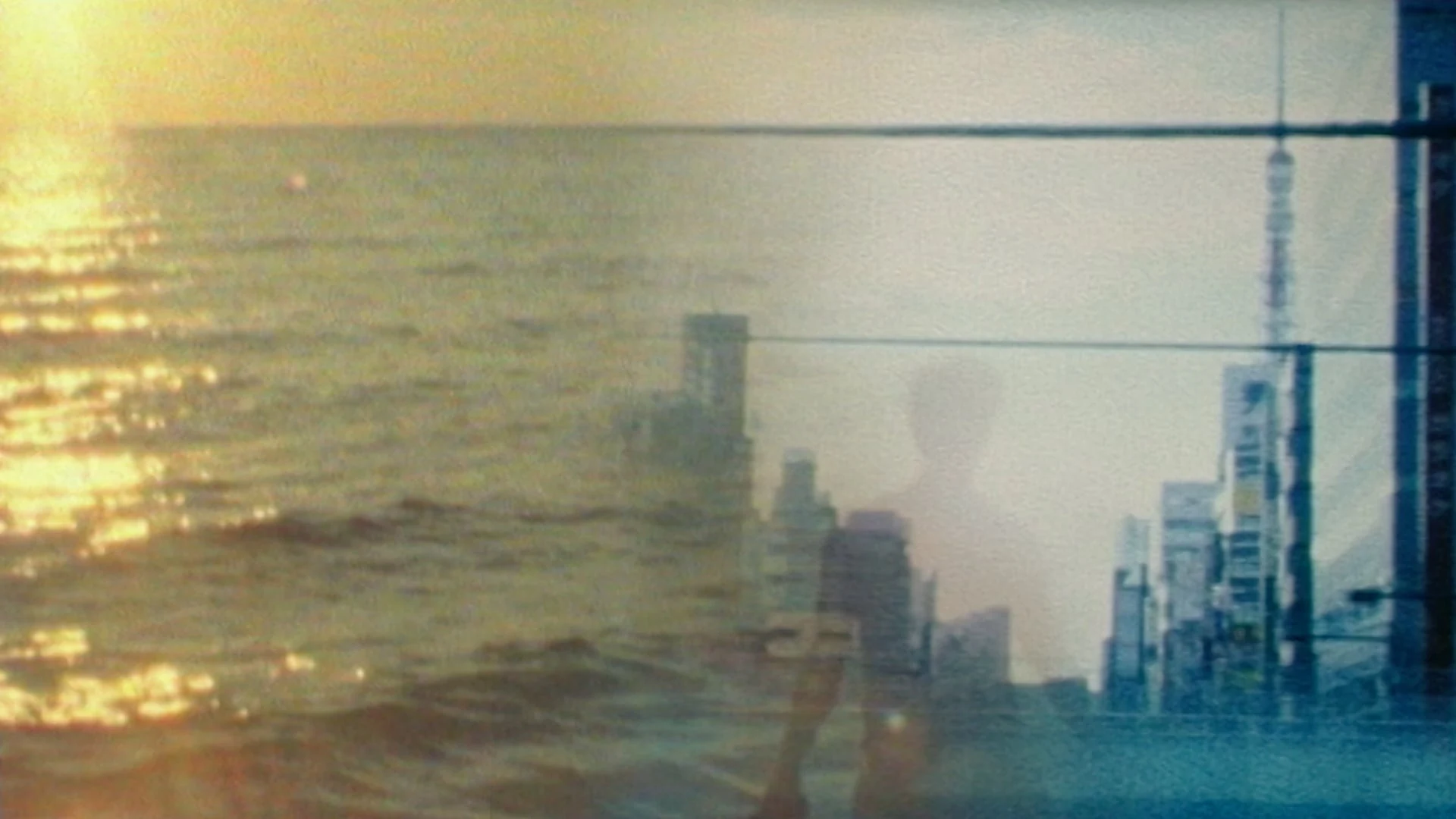 The Threads film image, layering golden water with a blue-grey city view crossed by overhead wires
